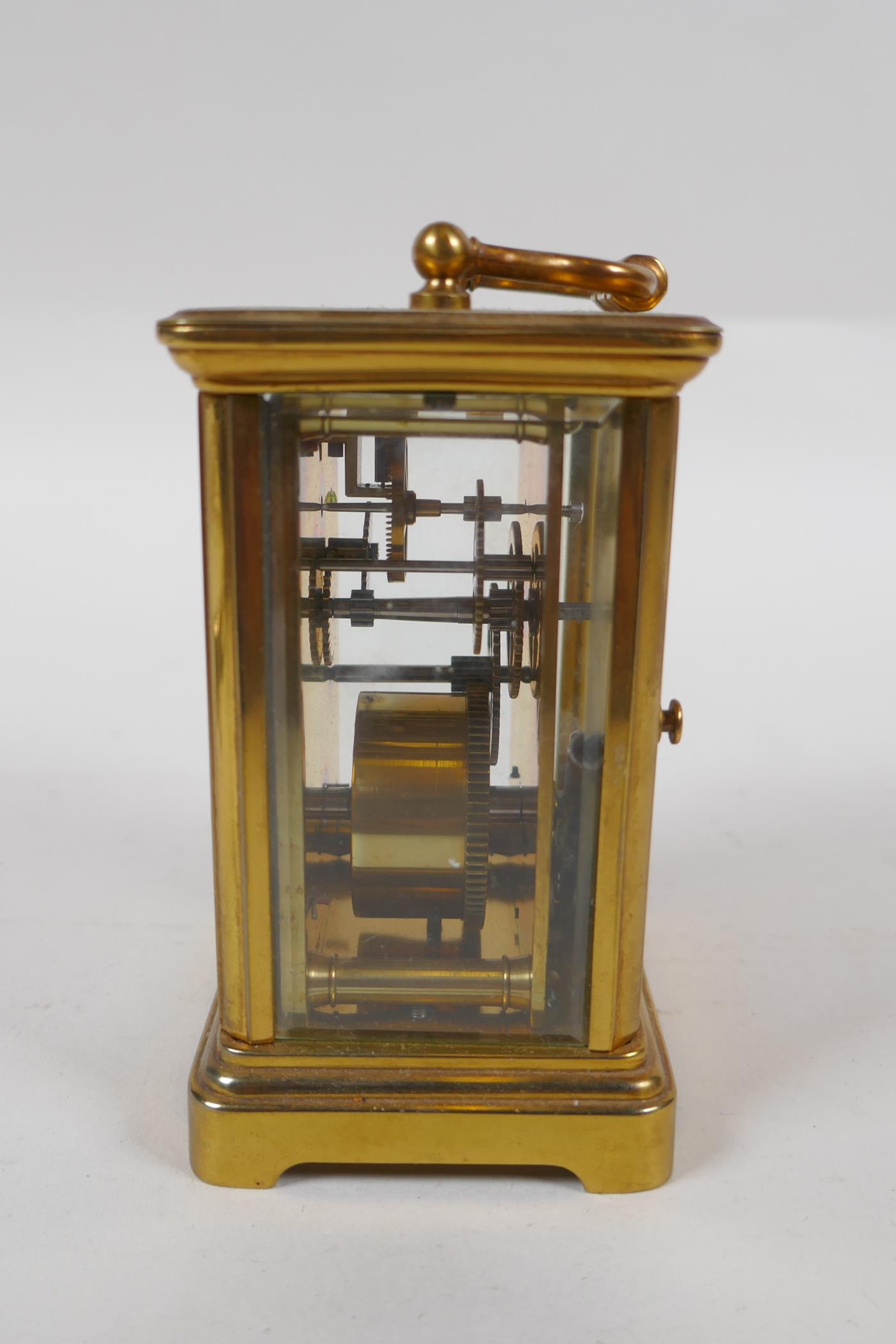 A brass cased carriage clock, the enamel dial with Roman numerals, 8 x 6cm, 11cm high - Image 4 of 4