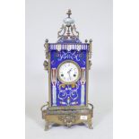 A French style brass case mantel clock with inset cloisonne enamel decoration and enamel dial with