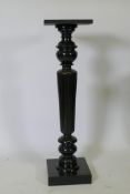A Victorian ebonised jardiniere stand, raised  on a fluted tapering column, 96cm high