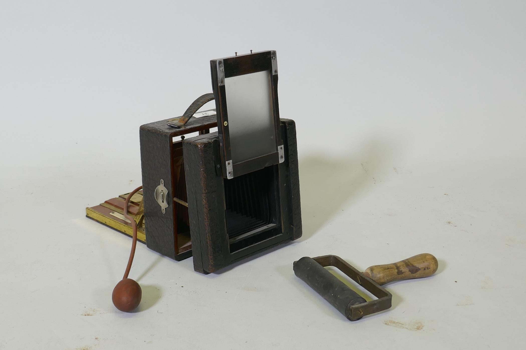 A Victorian bellows camera mahogany with brass mounts, in leather covered case, Koilos shutter and - Image 3 of 3