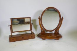 A Victorian figured mahogany swing toilet mirror with lift up top, 80cm high, and an early C20th
