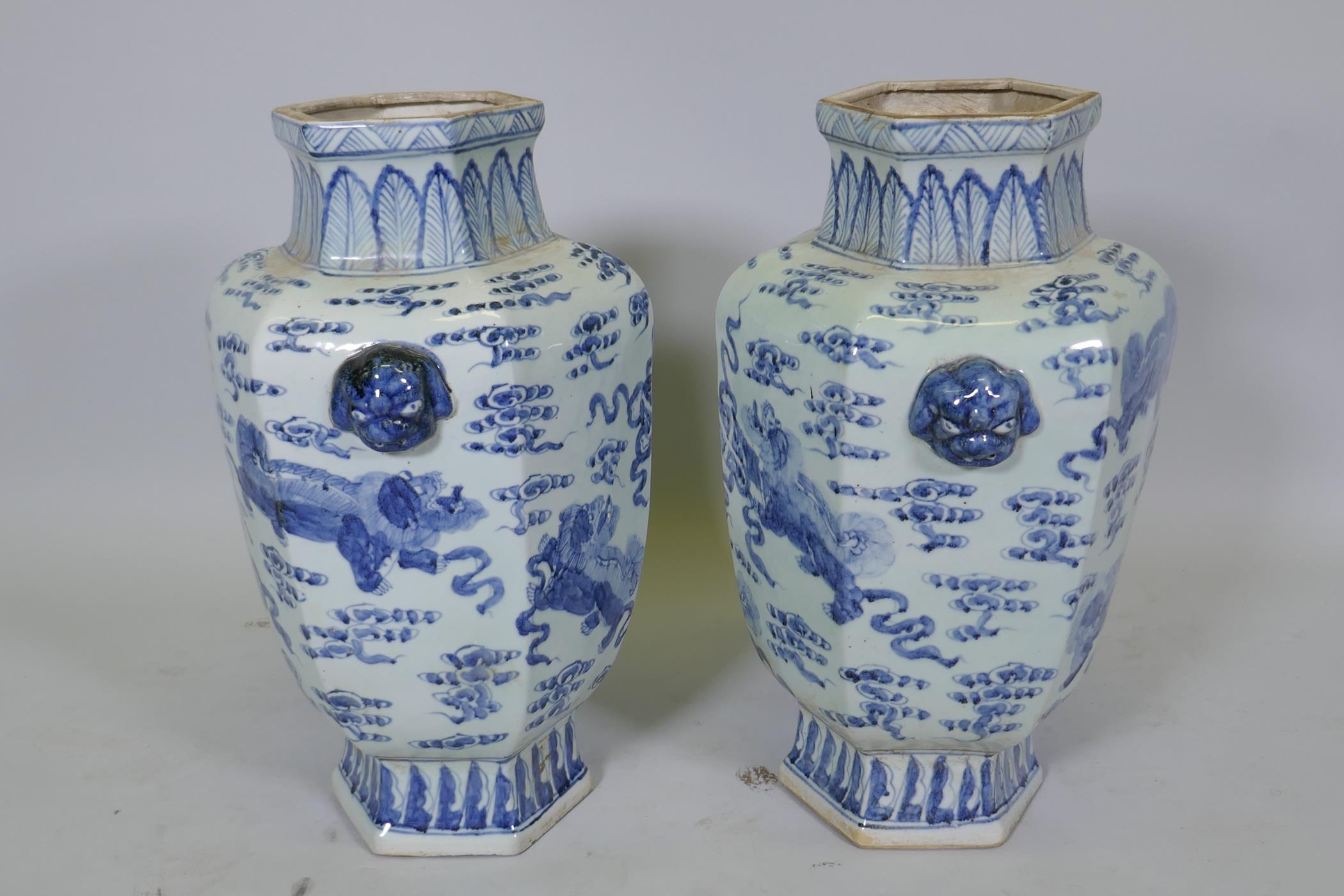 A pair of Chinese blue and white per hexagonal vases with two lion mask handles and kylin - Image 2 of 5