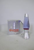 A Mathmos Astro violet/red lava lamp in original box, 44cm high