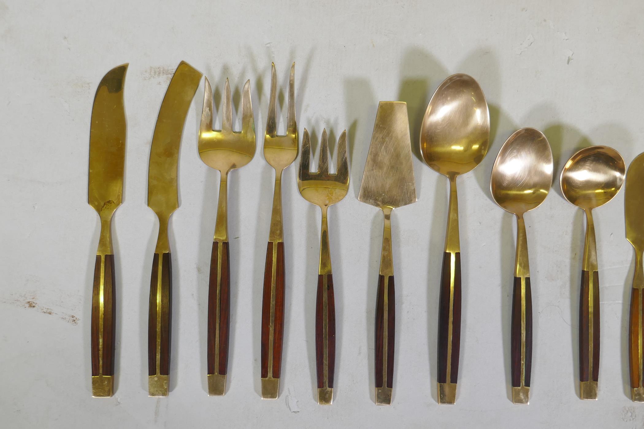 A canteen of brass and rosewood cutlery, probably Thai or Malaysian, 12 place settings - Image 5 of 7