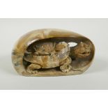 A Chinese reconstituted stone carving of a tortoise and its young, 17cm long