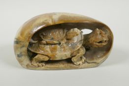 A Chinese reconstituted stone carving of a tortoise and its young, 17cm long