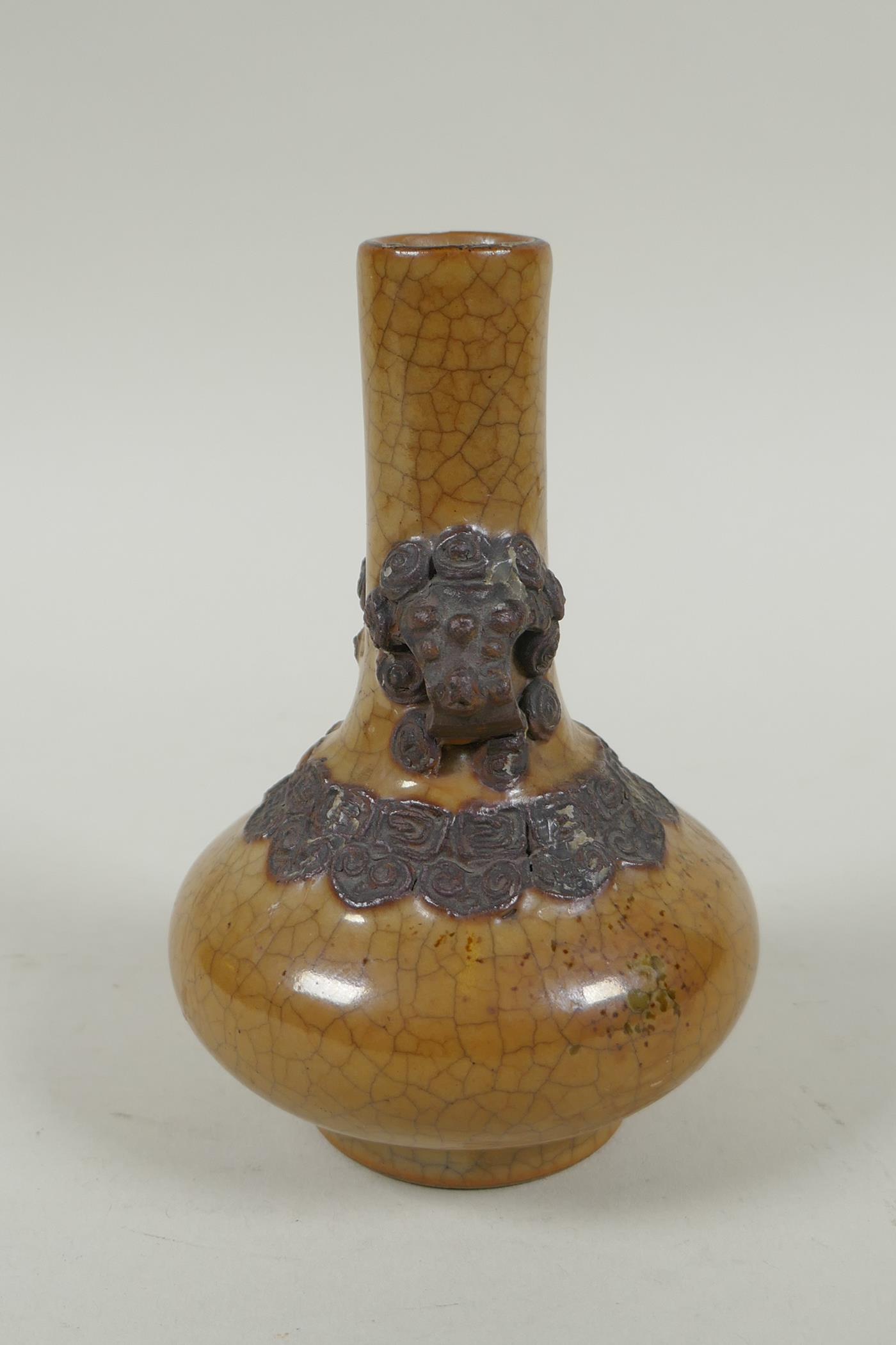 An antique Chinese crackleware bottle vase with two lion mask loop handles, 13cm high - Image 2 of 6