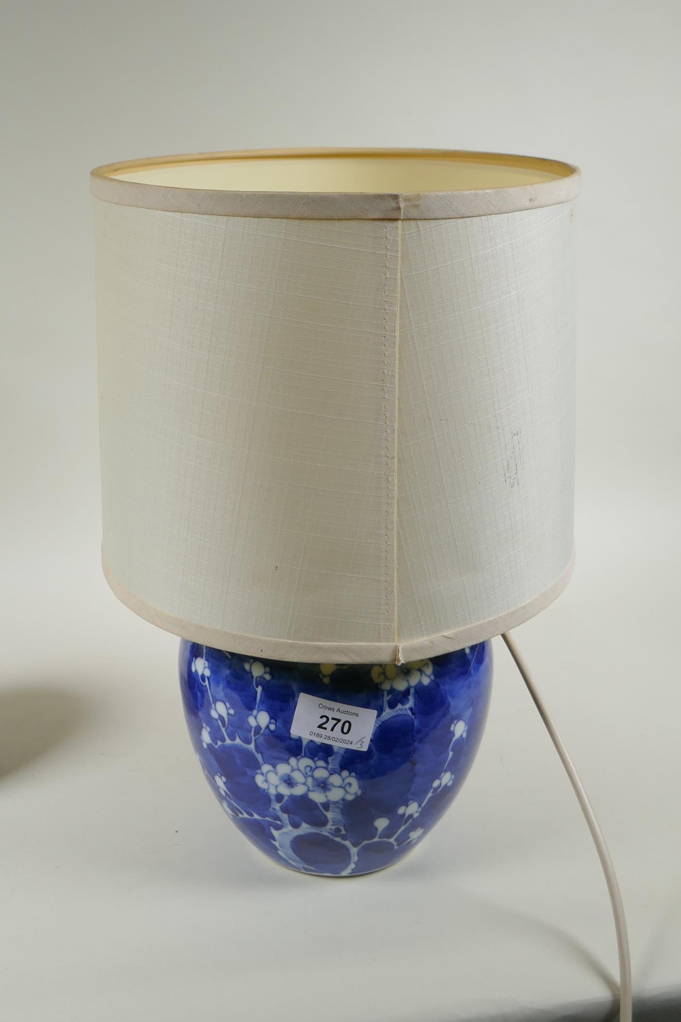 Three Chinese blue and white porcelain graduated ginger jars, decorated with prunus blossom on a - Image 8 of 8