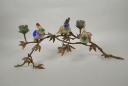 A polychrome porcelain and gilt metal candelabrum in the form of cockatoos perched on a branch, 56cm