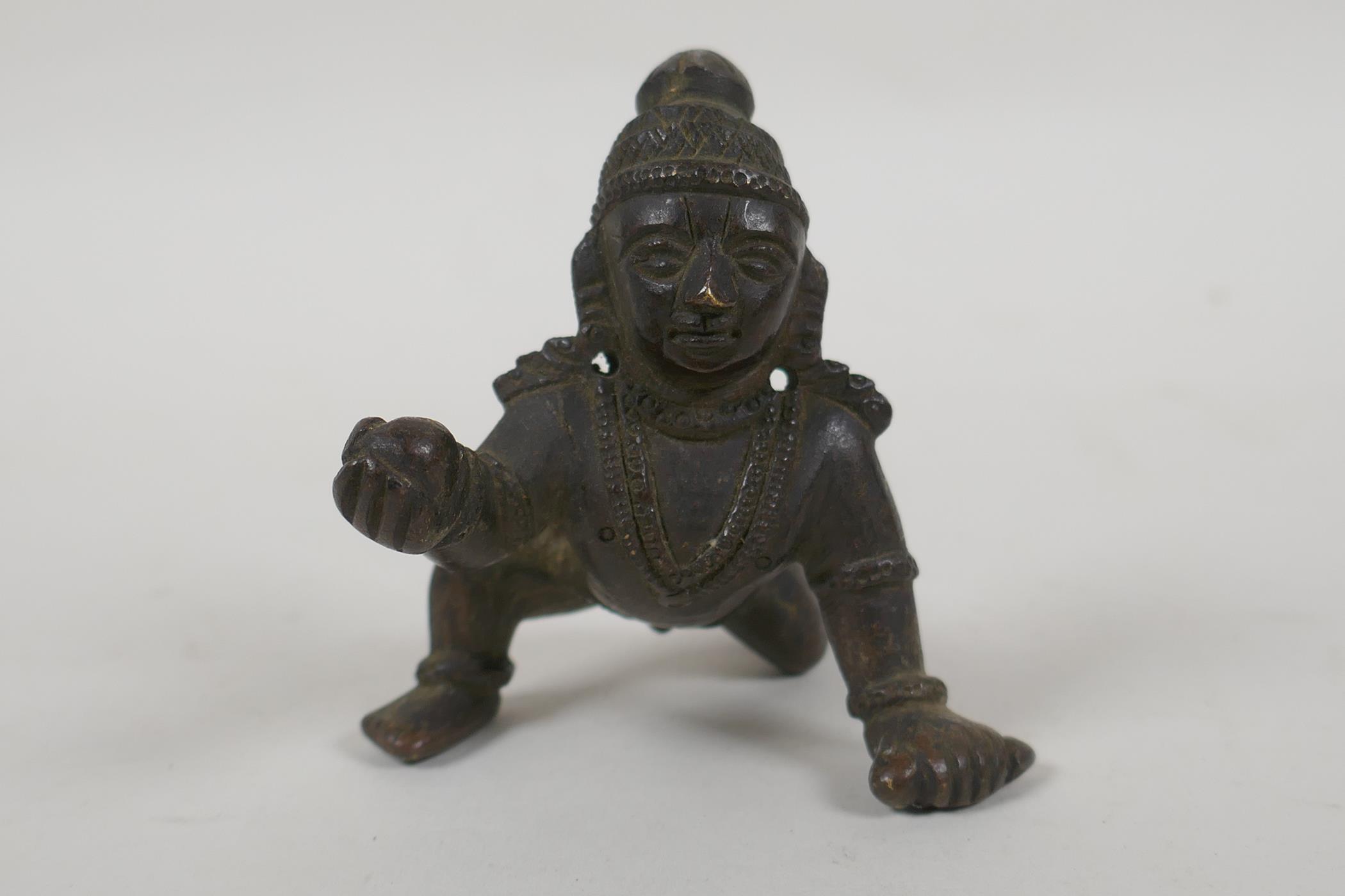 An antique Indian bronze of a crawling figure, 8cm long - Image 2 of 3