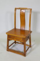 A Chinese elm low chair with single side drawer to the seat, 79cm high