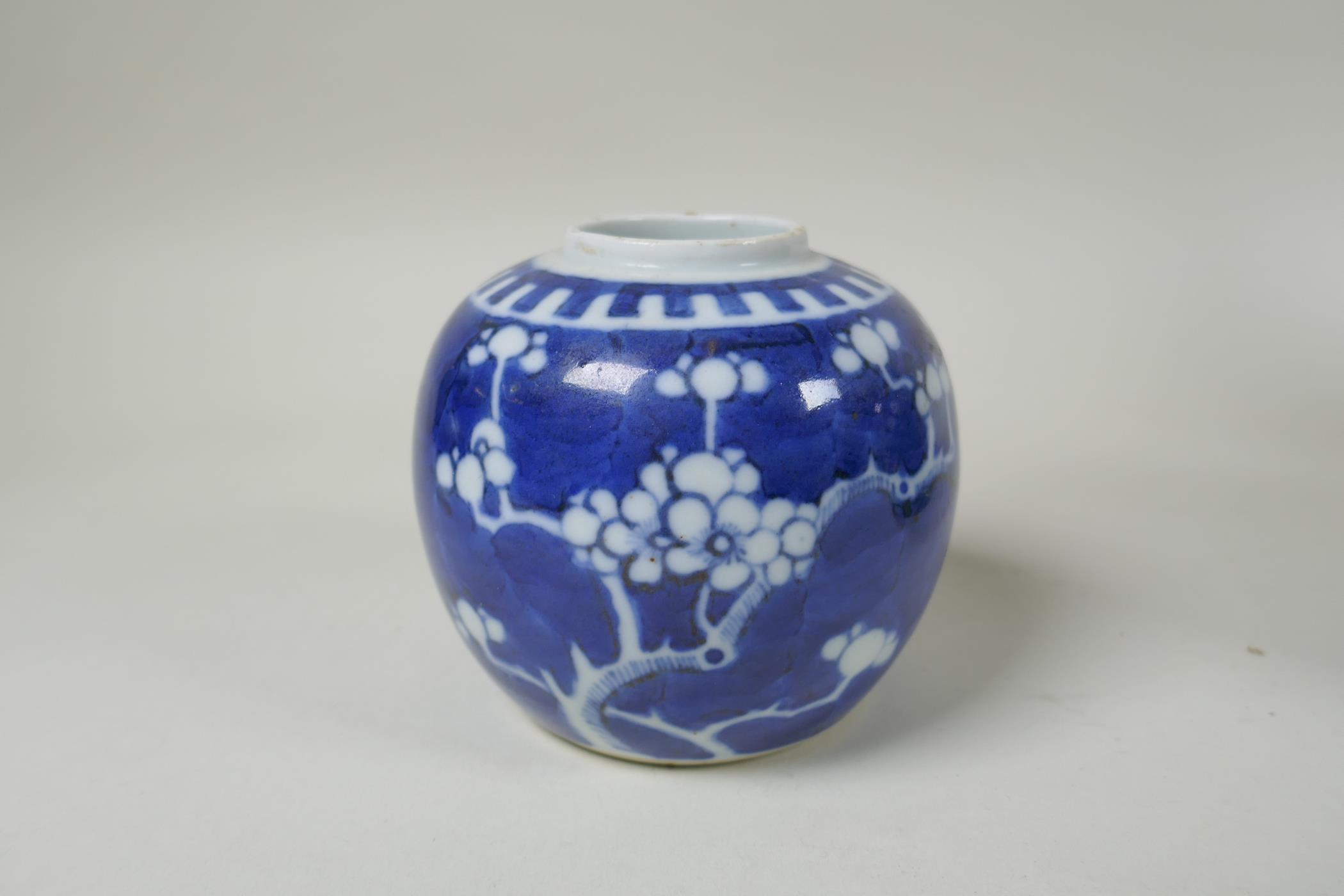 Three Chinese blue and white porcelain graduated ginger jars, decorated with prunus blossom on a - Image 2 of 8