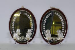 William Tonks & Sons, a pair of Victoria girandoles, the mirrors etched and engraved with trailing