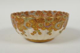 A Japanese Meiji period satsuma millefiori bowl of ribbed form, signed to the base Fuzan Ryun (?),