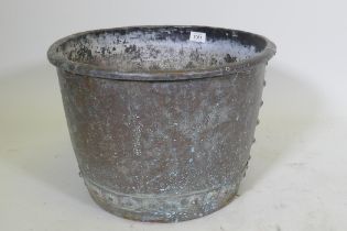 An antique copper jardiniere/planter of rivetted construction, 42cm diameter x 30cm high