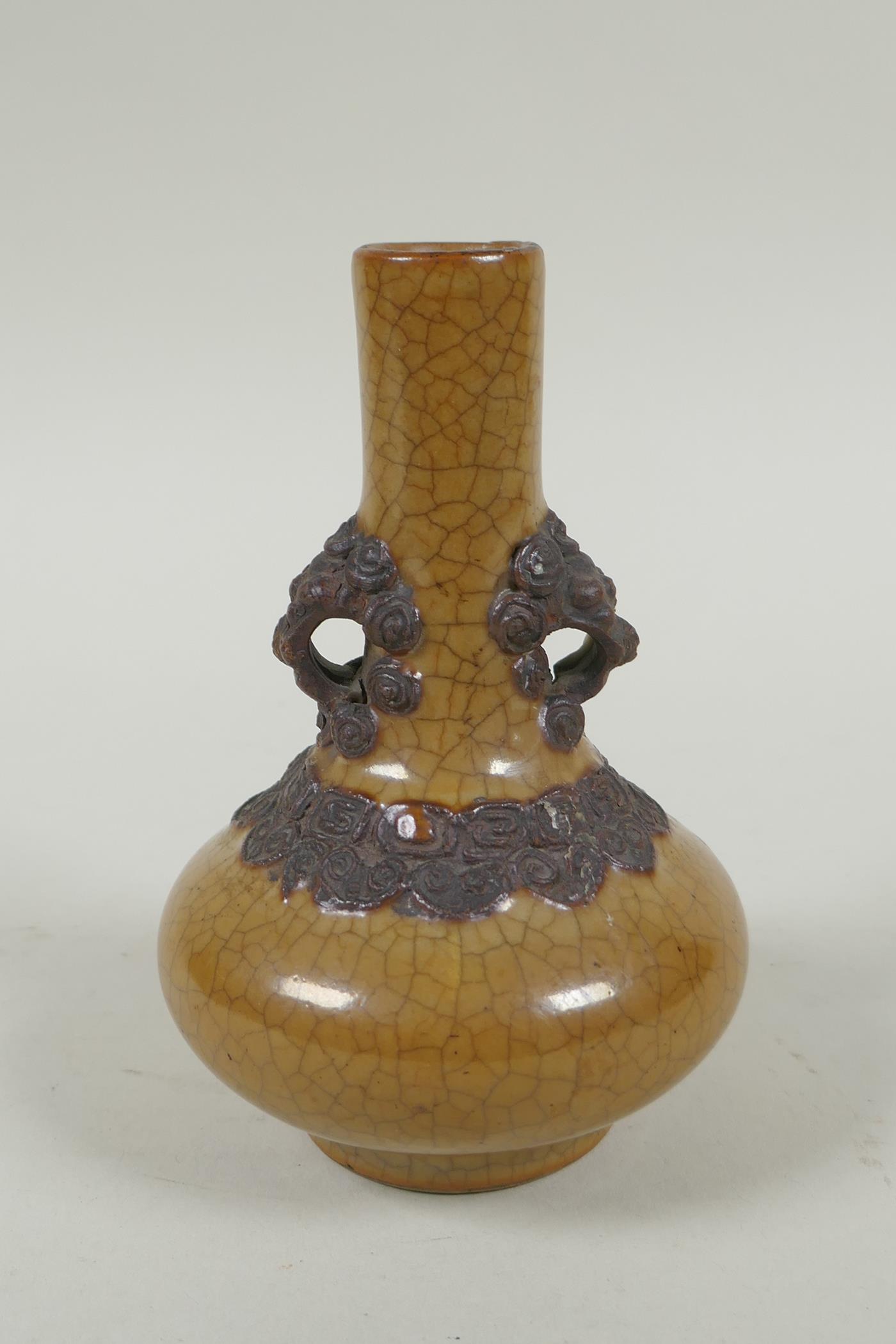 An antique Chinese crackleware bottle vase with two lion mask loop handles, 13cm high - Image 3 of 6