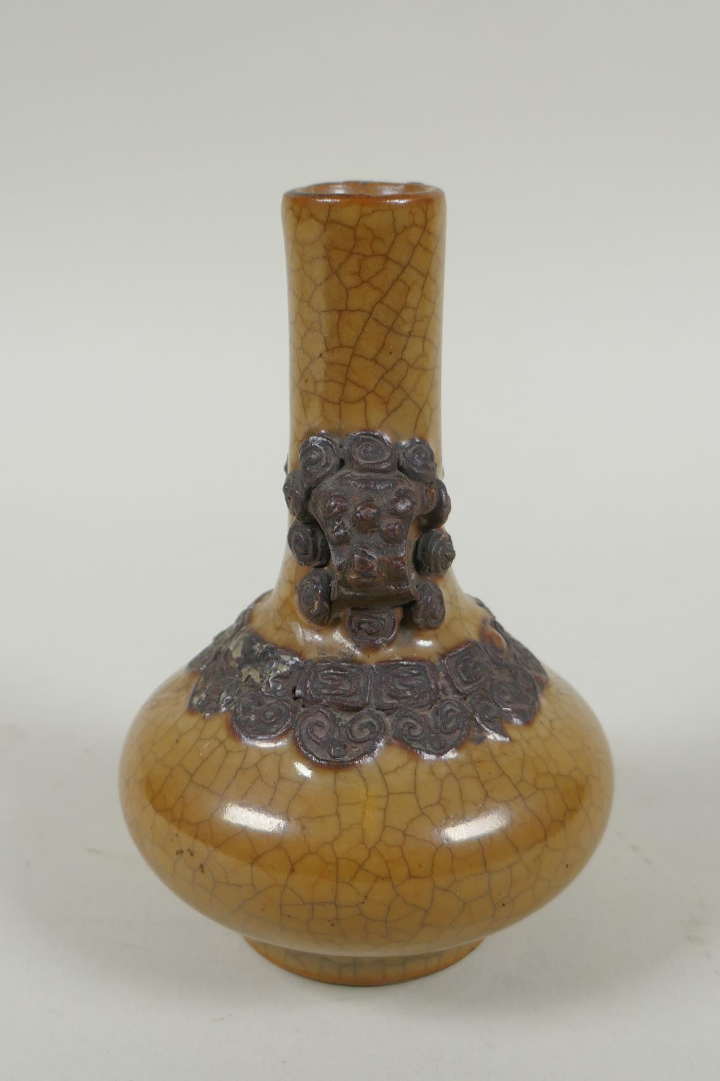 An antique Chinese crackleware bottle vase with two lion mask loop handles, 13cm high - Image 4 of 6