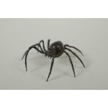 A Japanese style bronze okimono spider, 7cm wide