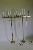 A Judaica pair of brass Menorah candlesticks, AF, 175cm high