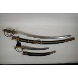 An Indian sabre with brass hilt and copper mounts, together with another smaller, longest blade 75cm