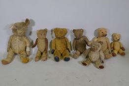 A collection of antique plush teddy bears for repair, largest 67cm long
