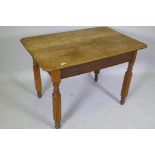 An antique continental oak plank top table, raised on reeded supports, 103 x 74 x 74cm