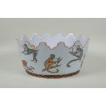 An early C20th Chinese Republic polychrome porcelain Monteith bowl, decorated with monkeys, goldfish
