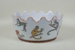 An early C20th Chinese Republic polychrome porcelain Monteith bowl, decorated with monkeys, goldfish