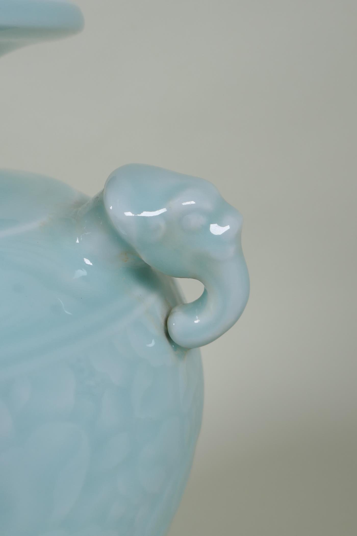 A Chinese celadon glazed porcelain vase with two elephant mask handles and underglaze floral - Image 2 of 6