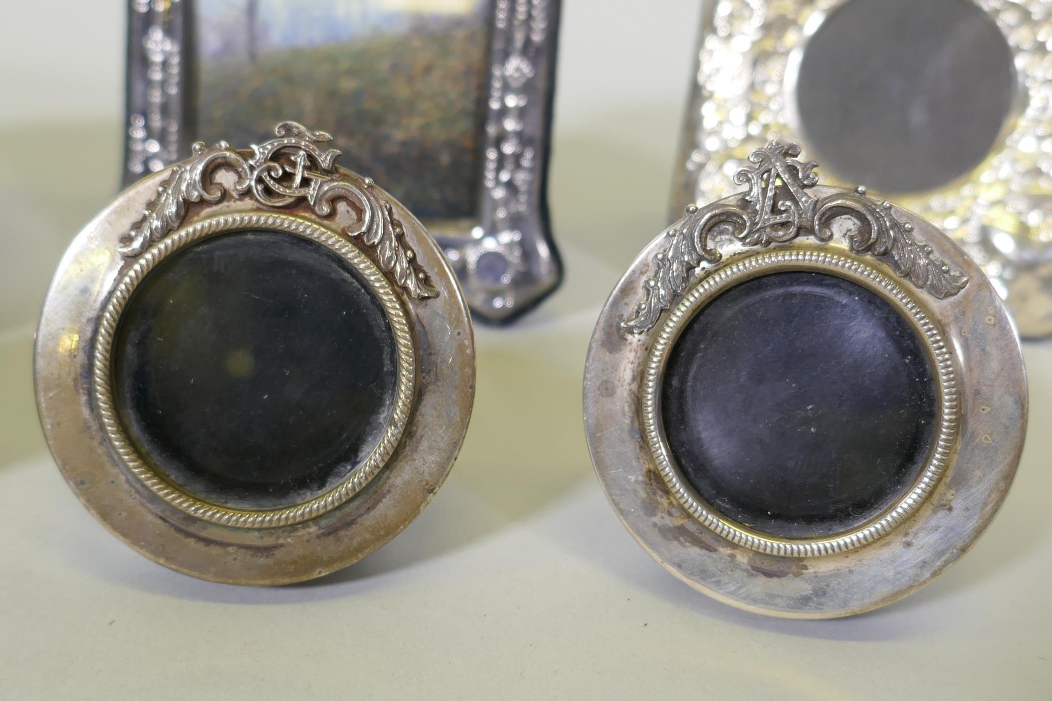 Three miniature silver photo frames with monogram crests, aperture 3.5cm diameter, and three others - Image 3 of 4