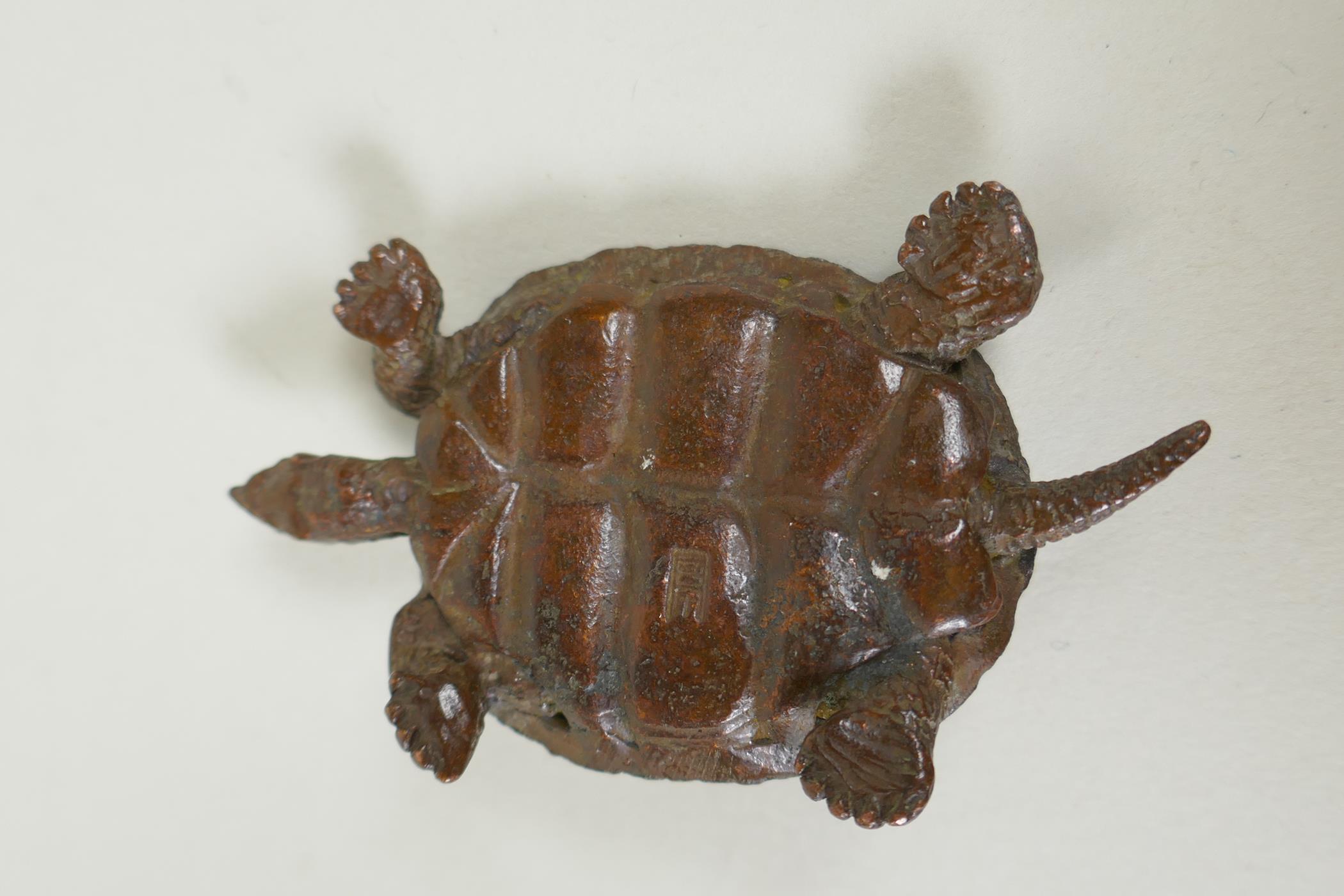 A Japane4se style bronze okimono tortoise, the shell with character inscriptions, 7cm long - Image 3 of 3