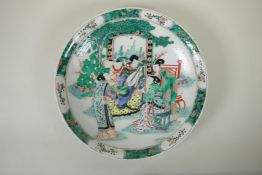 A Chinese KangXi style famille vert porcelain charger, decorated with women playing music, mark to