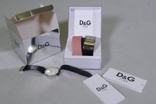 A Dolce & Gabbana 'Time' stainless steel wristwatch and strap in box, and an Accurist quartz