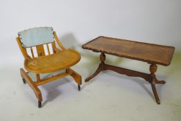A vintage child's baby walker, and a coffee table by Shaw of London