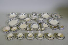 A Doulton Burslem Nankin part dinner and tea service with various sized plates, saucers serving