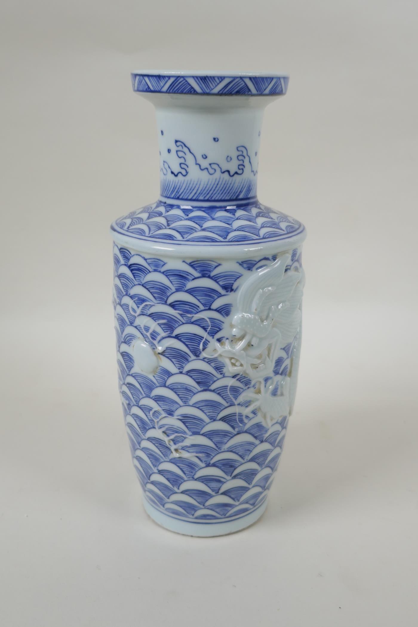 A Chinese blue and white porcelain vase with raised dragon decoration, impressed mark to base, - Image 4 of 5