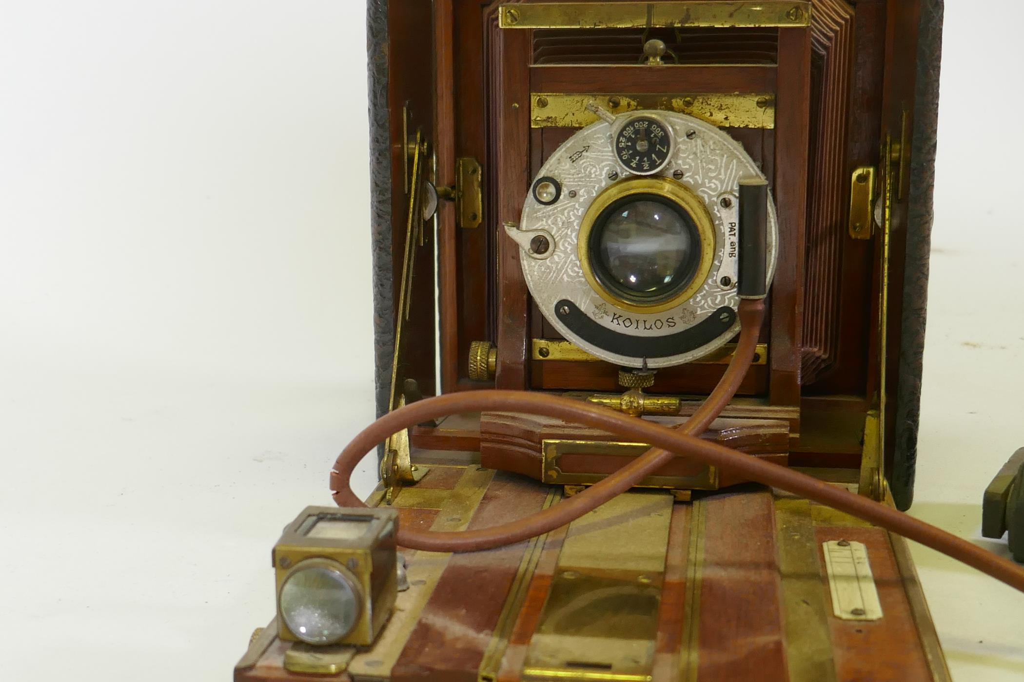 A Victorian bellows camera mahogany with brass mounts, in leather covered case, Koilos shutter and - Image 2 of 3