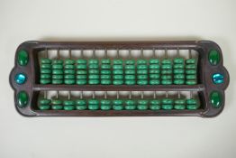A Chinese hardwood abacus with turquoise beads, 41 x 14cm