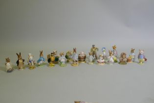 A collection of vintage Beswick Beatrix Potter figurines, gold and brown back stamps including