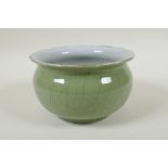 A Chinese celadon crackle glazed porcelain bowl, 17cm diameter