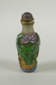A Peking glass snuff bottle with carved and enamelled decoration of frogs, waterfowl and lotus