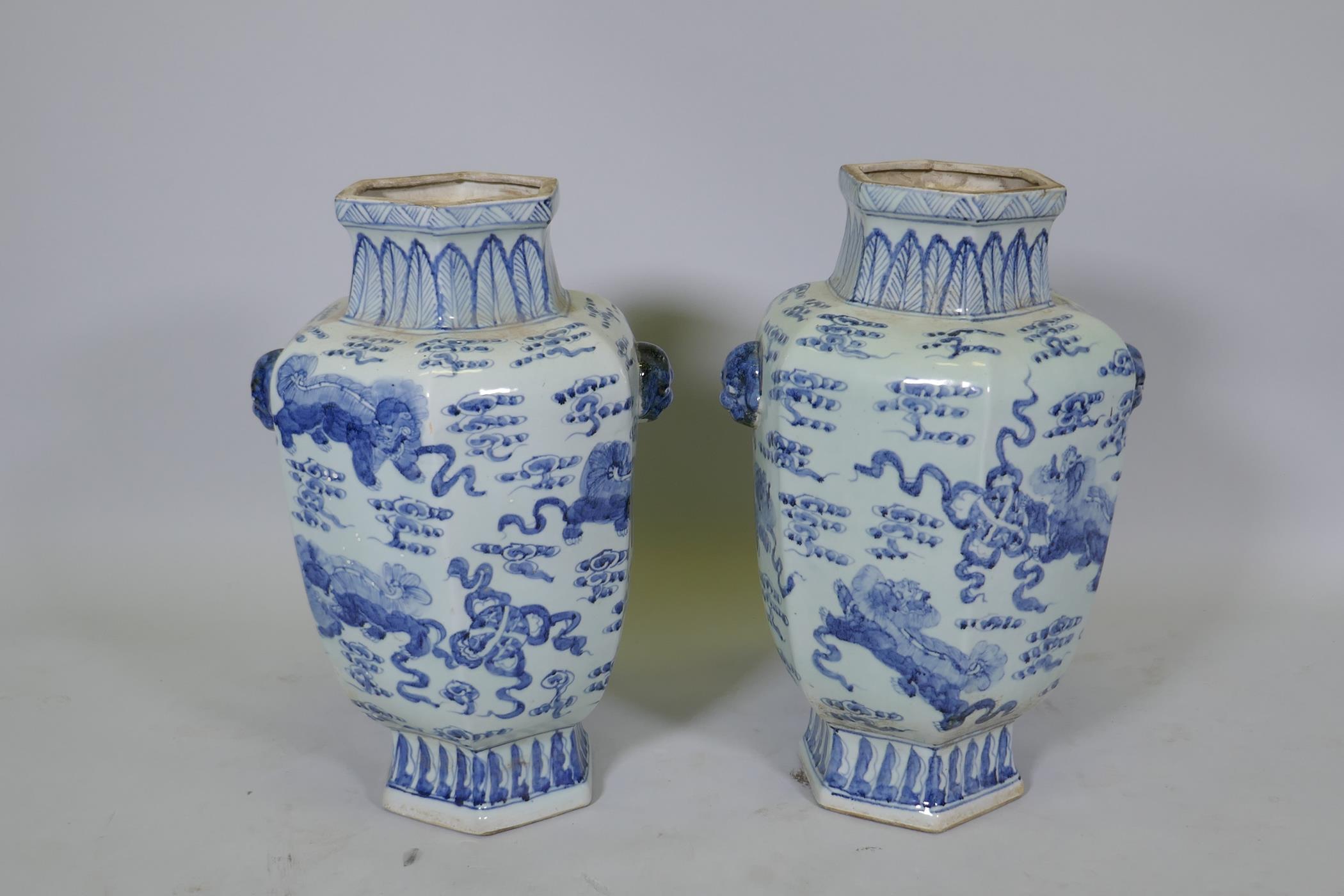 A pair of Chinese blue and white per hexagonal vases with two lion mask handles and kylin - Image 3 of 5