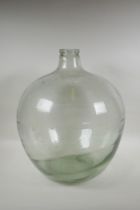 A large green glass terrarium/jar, 52cm high