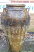 A large vintage terracotta amphora shaped garden pot with cover, 101cm high
