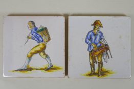 A pair of antique faience tiles decorated with trades people, 14 x 14cm