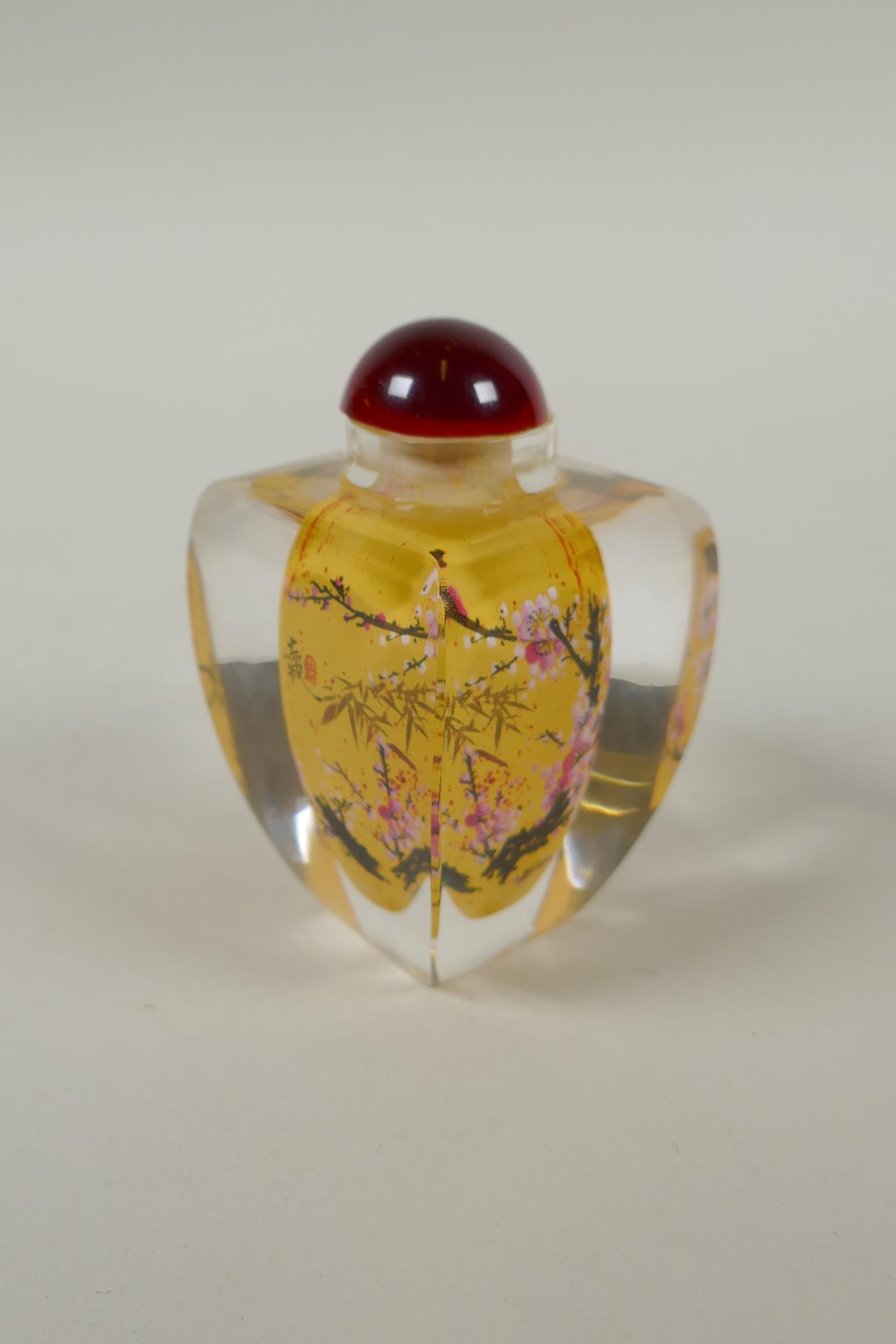 A Chinese reverse painted glass snuff bottle decorated with a branch in bloom, 9cm high - Image 6 of 7