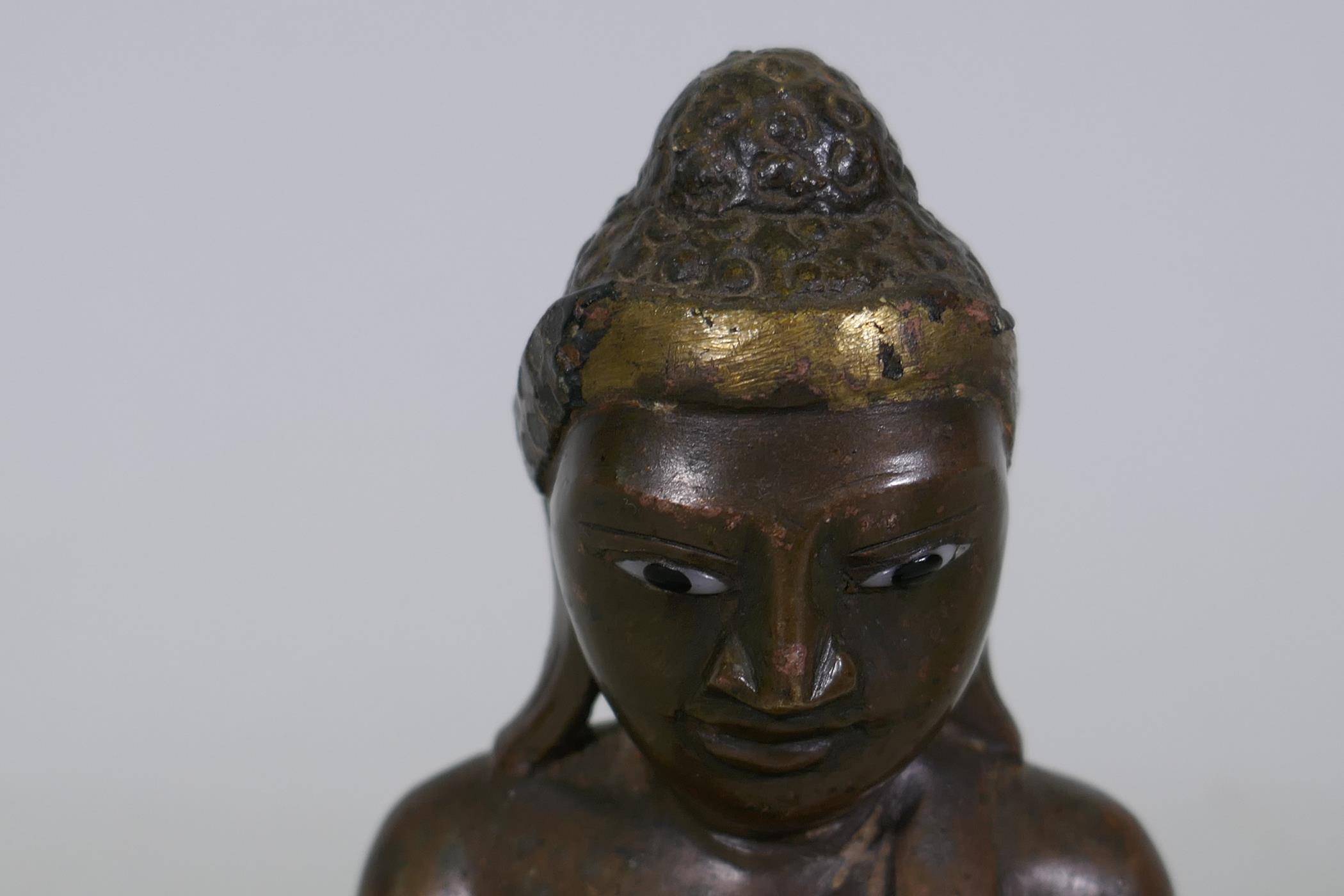 Oriental bronze Buddha with inset glass eyes, possibly Burmese, 17cm high - Image 6 of 7