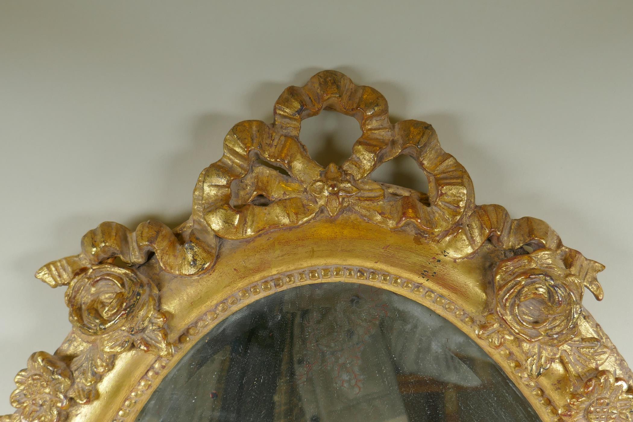 An antique French oval gilt mirror, with bevelled antique glass, 53 x 87cm - Image 4 of 8