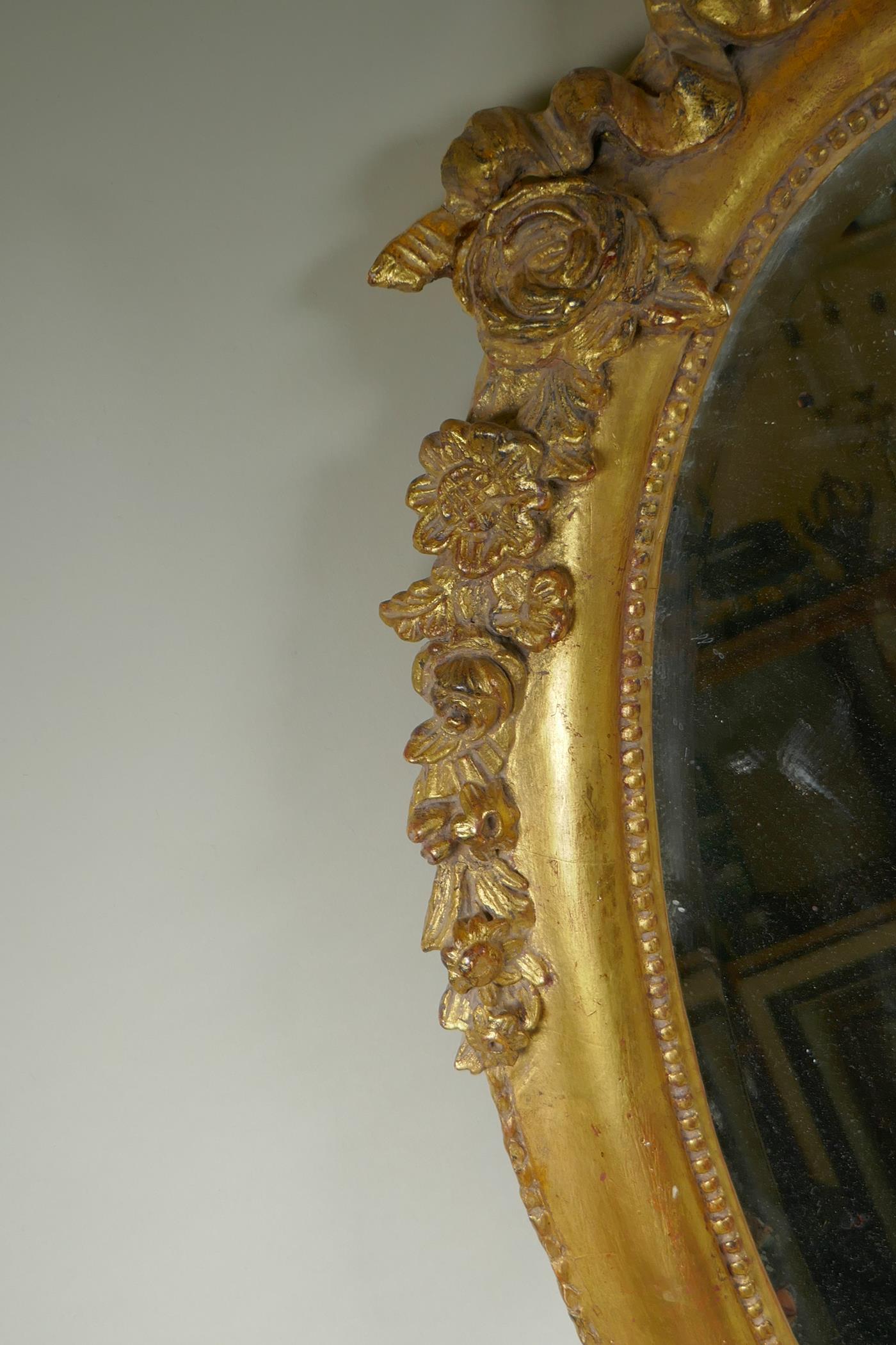 An antique French oval gilt mirror, with bevelled antique glass, 53 x 87cm - Image 3 of 8