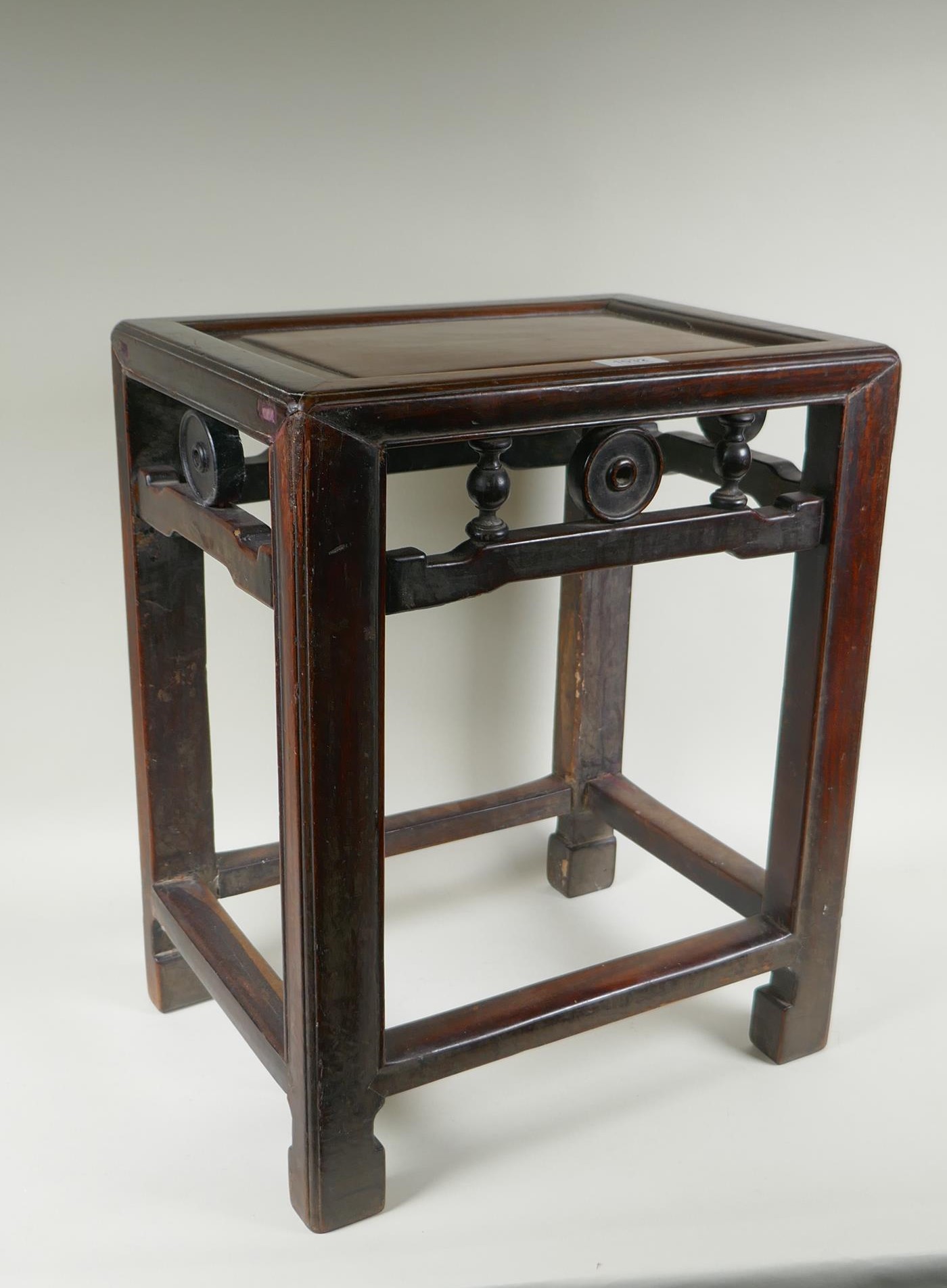 An antique Chinese hardwood lamp table, 40 x 30cm, 49cm high